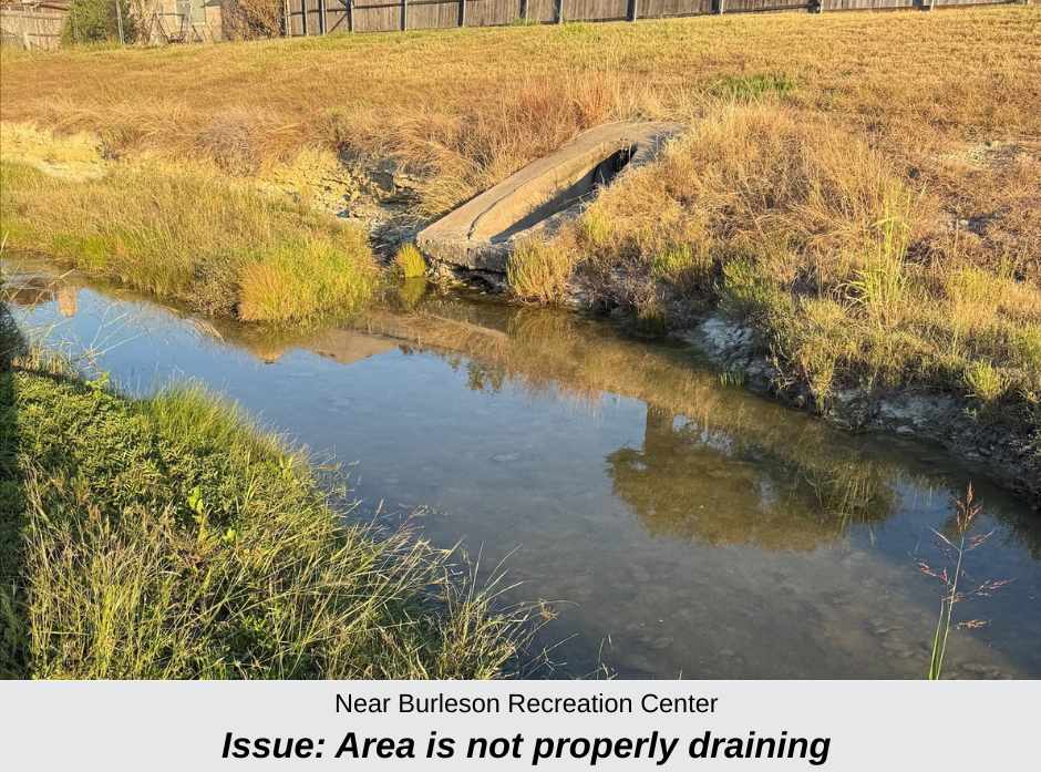 a photo of a drainage area not properly draining near the Burleson recreation center