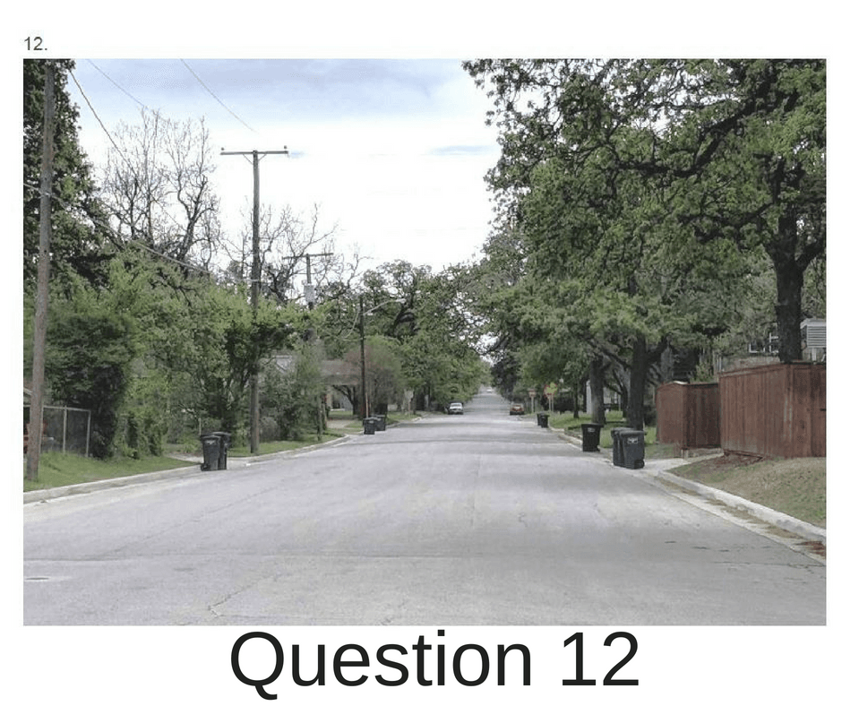 Picture of a street with trash carts